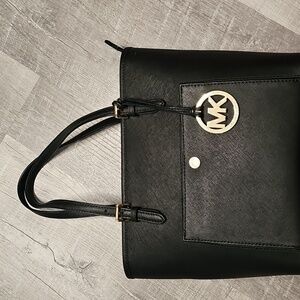 Michael Kors Beautiful Black handbag. 12X 91/2 inches. 8 inch drop.